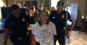 Protesting Big Pharma &#039;Death Sentence,&#039; Cancer Patient Arrested Outside TPP Talks