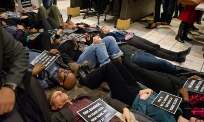 About 50 protesters entered the Longworth House Office building in Washington.