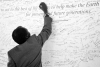 A participant signs the Earth Pledge at the United Nations Conference on Environment and Development, June 1992