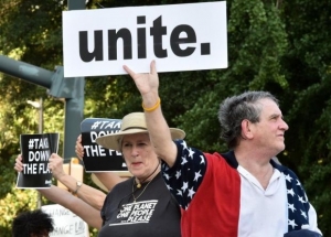  Hundreds gather for a protest rally against the Confederate flag in Columbia, South Carolina, on 20 June. 