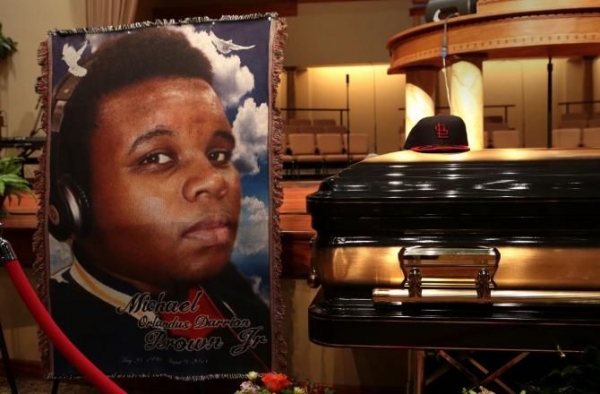 The casket of Michael Brown sits inside Friendly Temple Missionary Baptist Church awaiting the start of his funeral on Aug. 25, 2014, in St. Louis. 